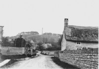 Lady on the Church Path in Compton Street Holly Cottage on right.
