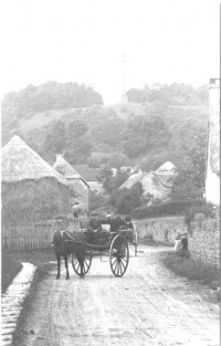 Upper Compton Street Early 1900's Boy and putt on Compton Street Next to the Church path