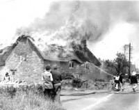 The fire started in this building and spread across the road and destroyed two others including the shop. John Fry’s House on fire 1972