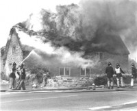 The fire started in this building and spread across the road and destroyed two others including the shop. John Fry’s House on fire 1972