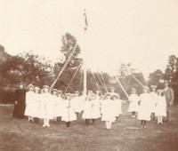 School maypole dancers c1900 School children performing a maypole dance